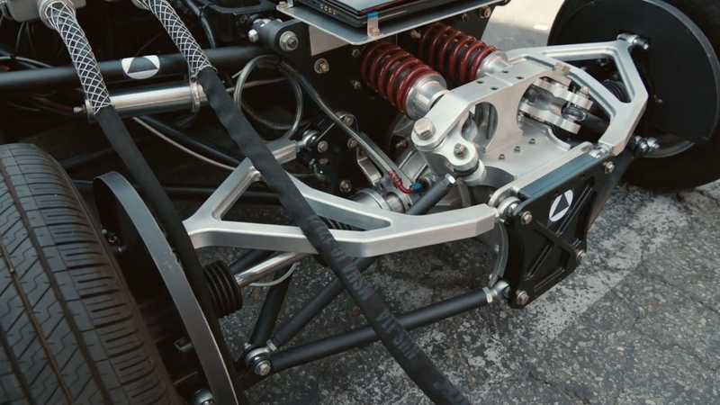 A view of the rear-wheel drive system and some of the very neat inboard pushrod suspension. Screenshot from Top Gear Magazine